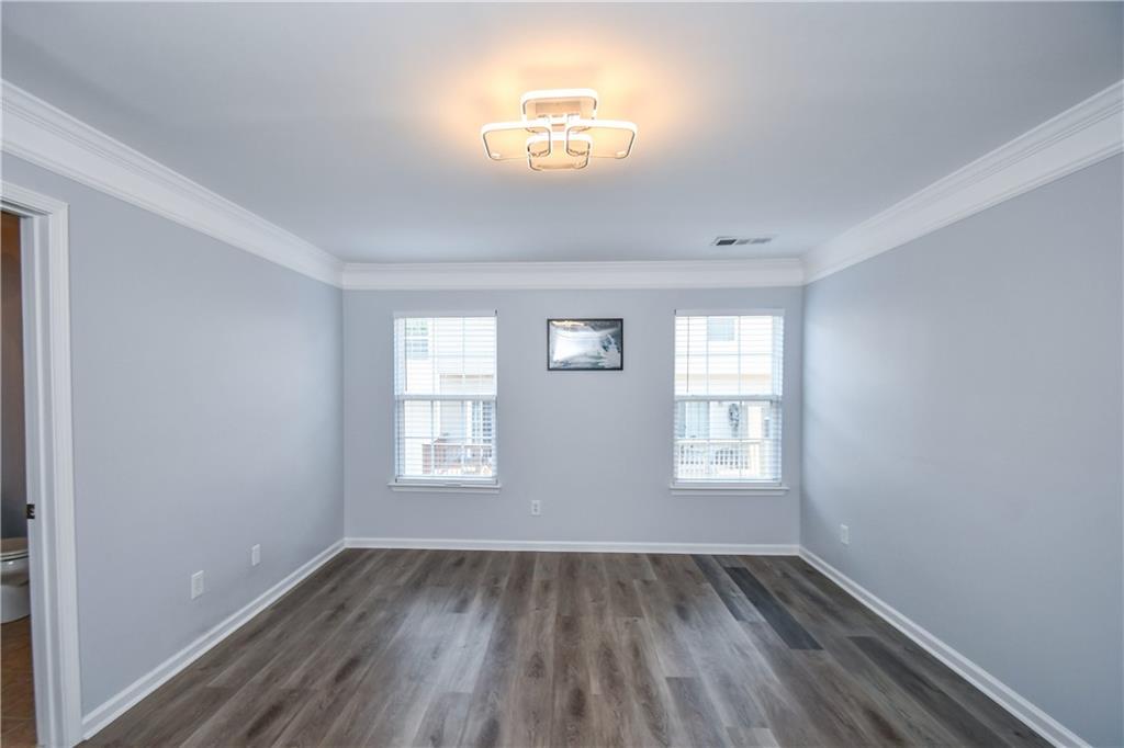 2201 Landing Walk Drive Duluth, GA 30097 - Photo 70 of 80 an empty room that has a window