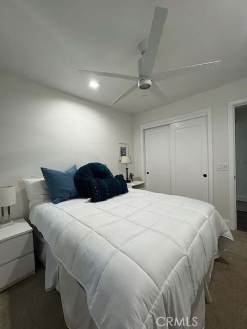 61 Birch Avenue Cayucos, CA 93430 - Photo 12 of 21 a large bedroom with a bed and a chandelier