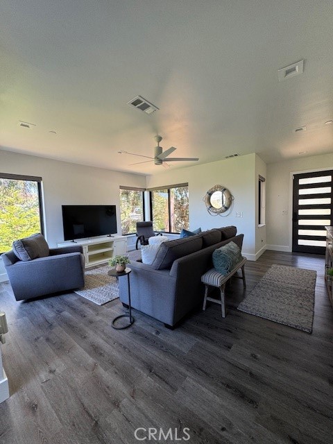 61 Birch Avenue Cayucos, CA 93430 - Photo 13 of 21 a living room with furniture and a flat screen tv
