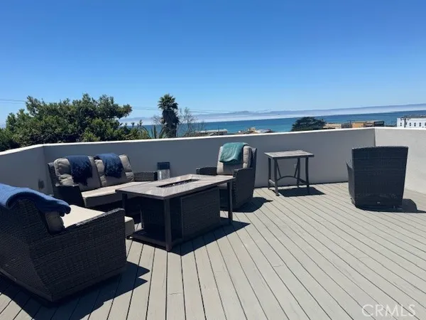 a view of a terrace with furniture
