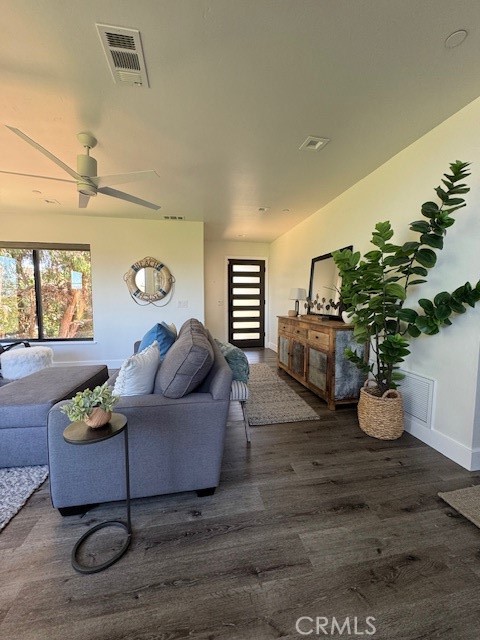 61 Birch Avenue Cayucos, CA 93430 - Photo 6 of 21 a living room with furniture and wooden floor