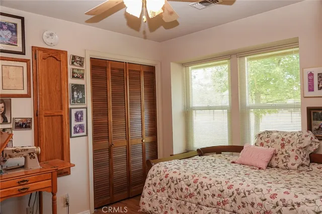 a bathroom with a sink vanity and a mirror