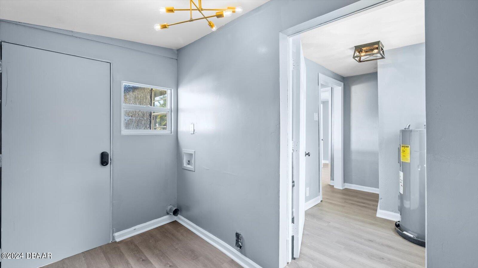 269 Selden Avenue Ormond Beach, FL 32174 - Photo 16 of 41 a view of hallway with wooden floor