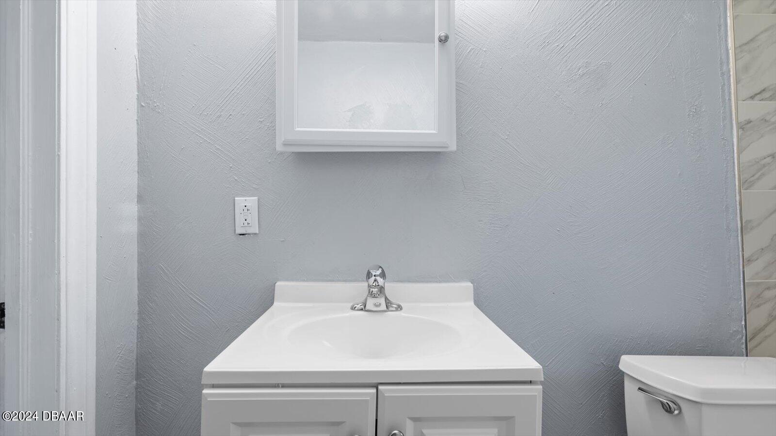 269 Selden Avenue Ormond Beach, FL 32174 - Photo 23 of 41 a bathroom with a sink and a toilet