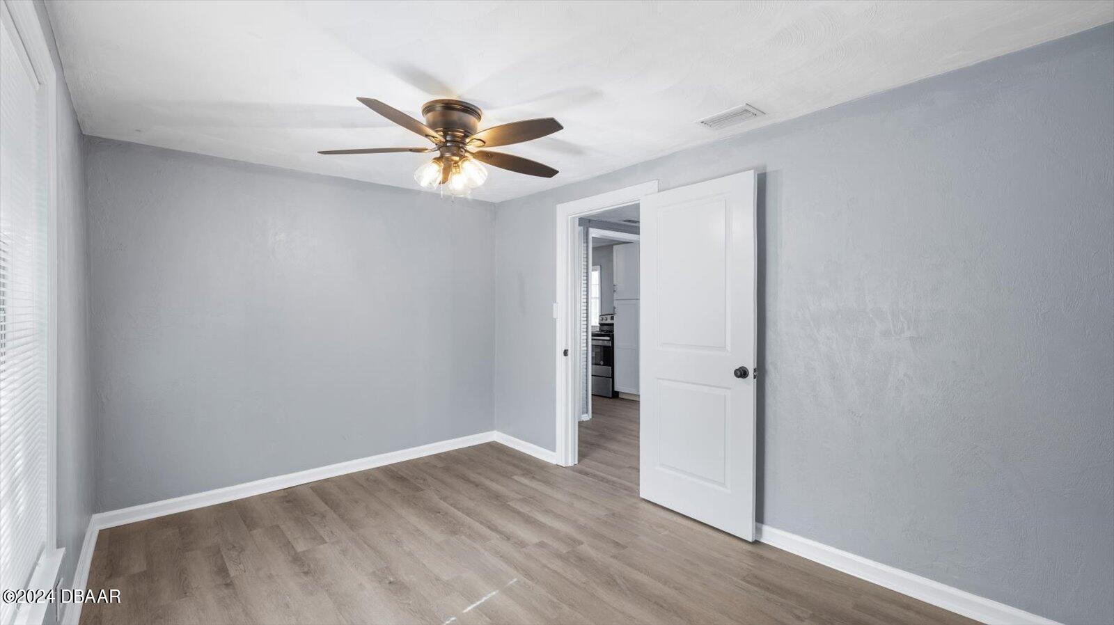 269 Selden Avenue Ormond Beach, FL 32174 - Photo 24 of 41 wooden floor in an empty room