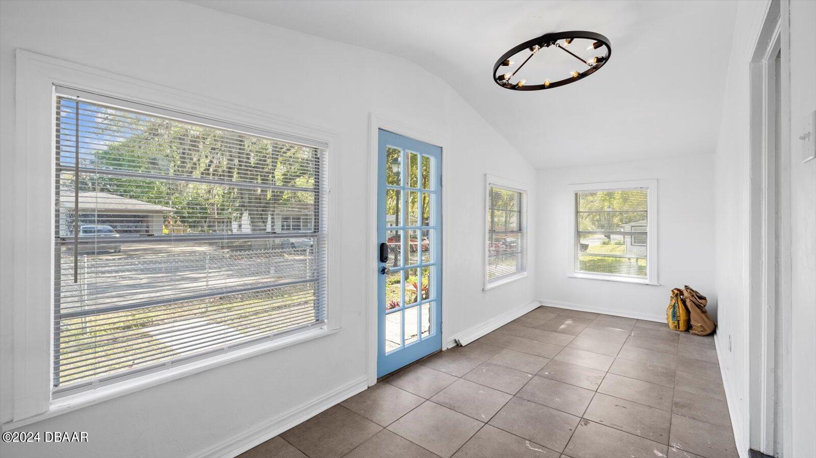 269 Selden Avenue Ormond Beach, FL 32174 - Photo 4 of 41 a view of an empty room with a window