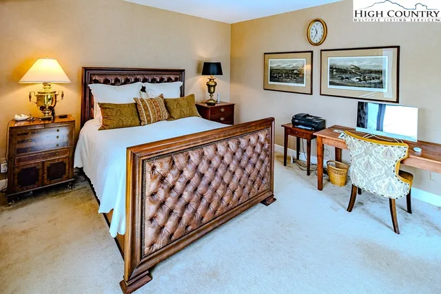 a bedroom with furniture and a bed