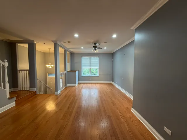 a bathroom with a double vanity sink toilet mirror and shower