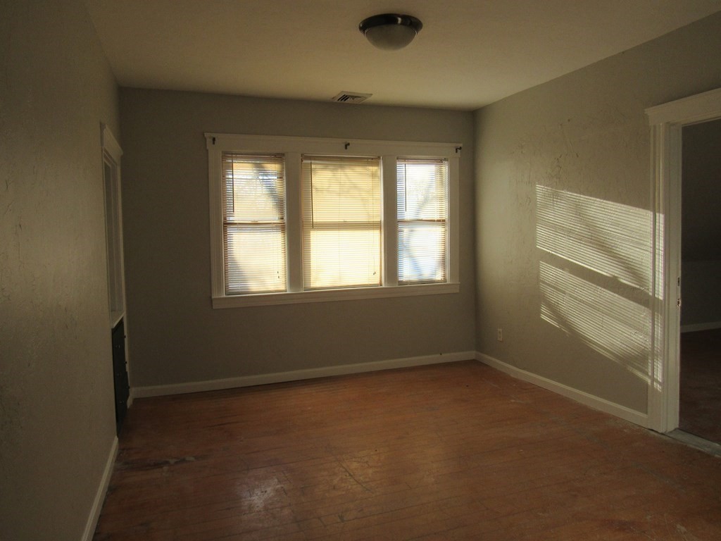 98 Brookline Street, Unit 1 Worcester, MA 01603 - Photo 11 of 18 an empty room with a window