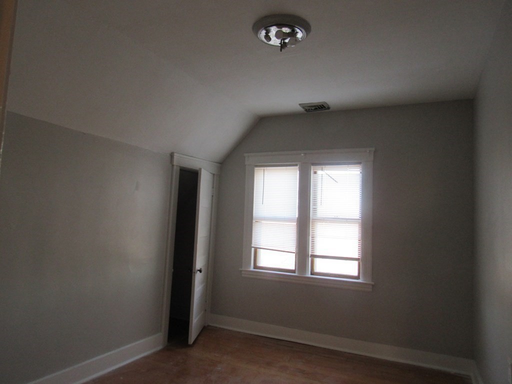 98 Brookline Street, Unit 1 Worcester, MA 01603 - Photo 12 of 18 an empty room with a window