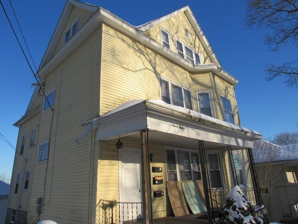 98 Brookline Street, Unit 1 Worcester, MA 01603 - Photo 2 of 18 a view of a building with a window