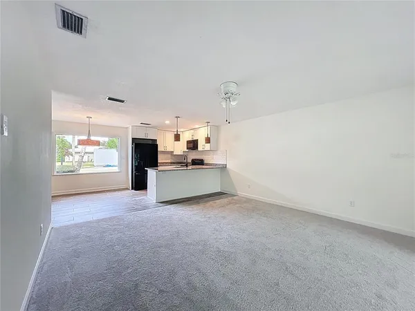 a view of a kitchen and a sink