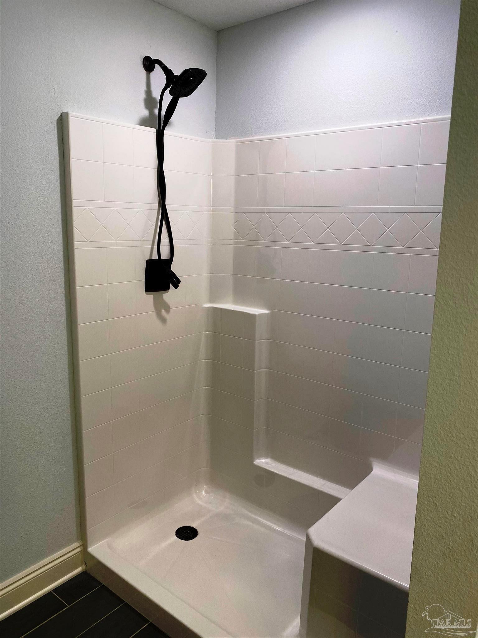 5424 South A Jones Road Milton, FL 32583 - Photo 22 of 27 Master bath has a fiberglass shower.