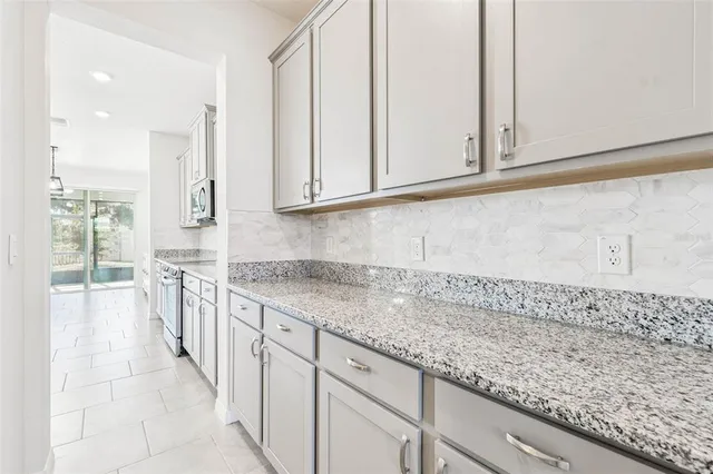 a bed room with a bed and a desk