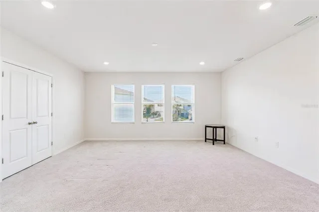 a view of a room with an empty space