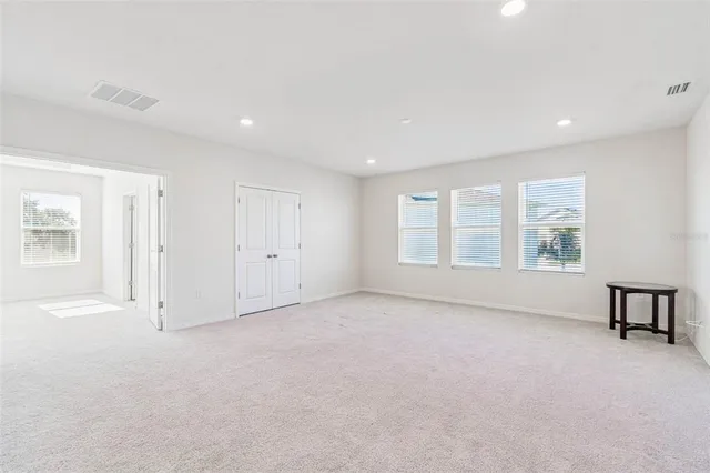 a view of a room with the hallway