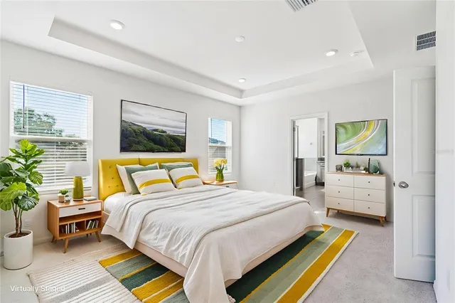 a view of an empty room with windows