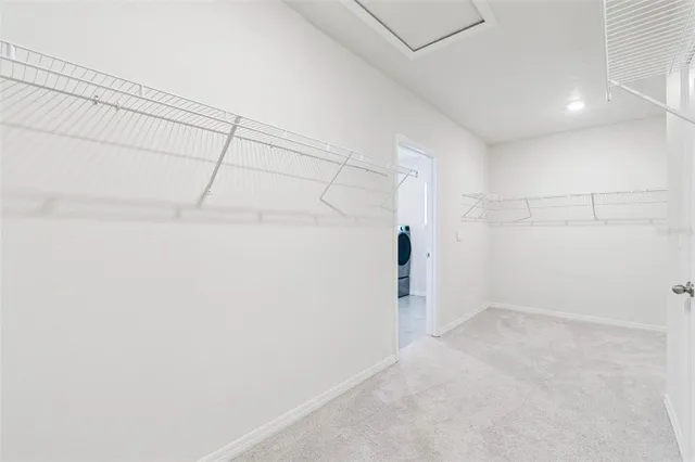 a view of a house with backyard and porch