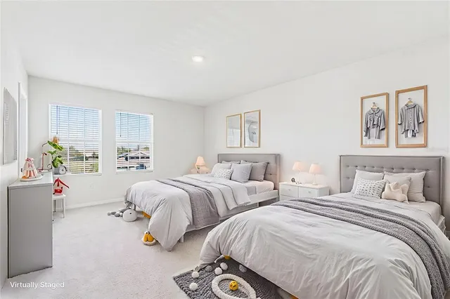 a view of a city with lawn chairs and palm trees