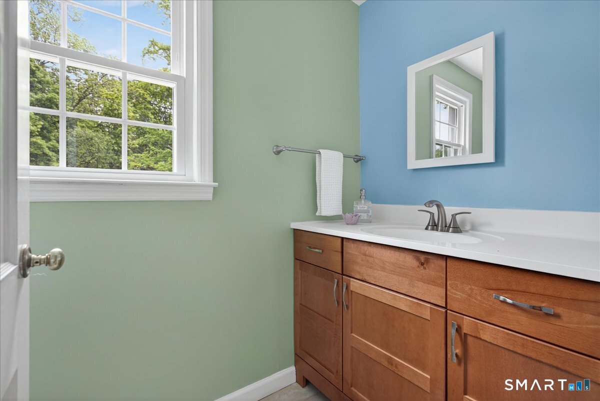 1006 King Road Cheshire, CT 06410 - Photo 15 of 40 The Half Bath on the main level is updated and covnenient.