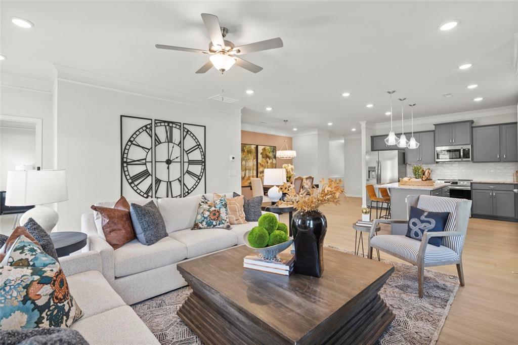 16 Willow Circle Rock Spring, GA 30739 - Photo 15 of 30 a living room with furniture kitchen and a chandelier