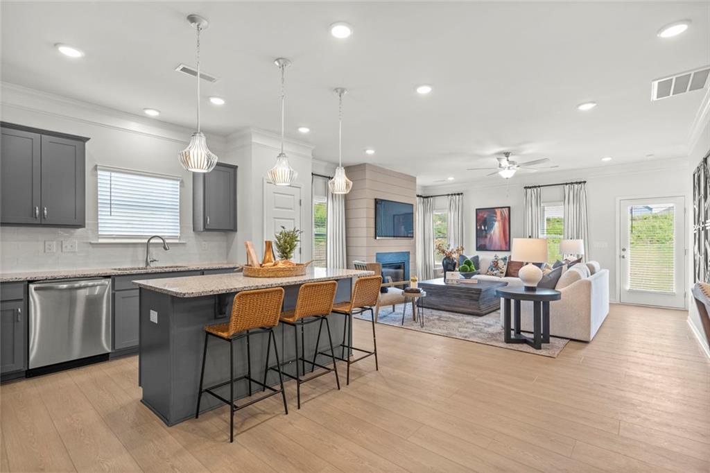 16 Willow Circle Rock Spring, GA 30739 - Photo 4 of 30 a large kitchen with lots of counter space and furniture