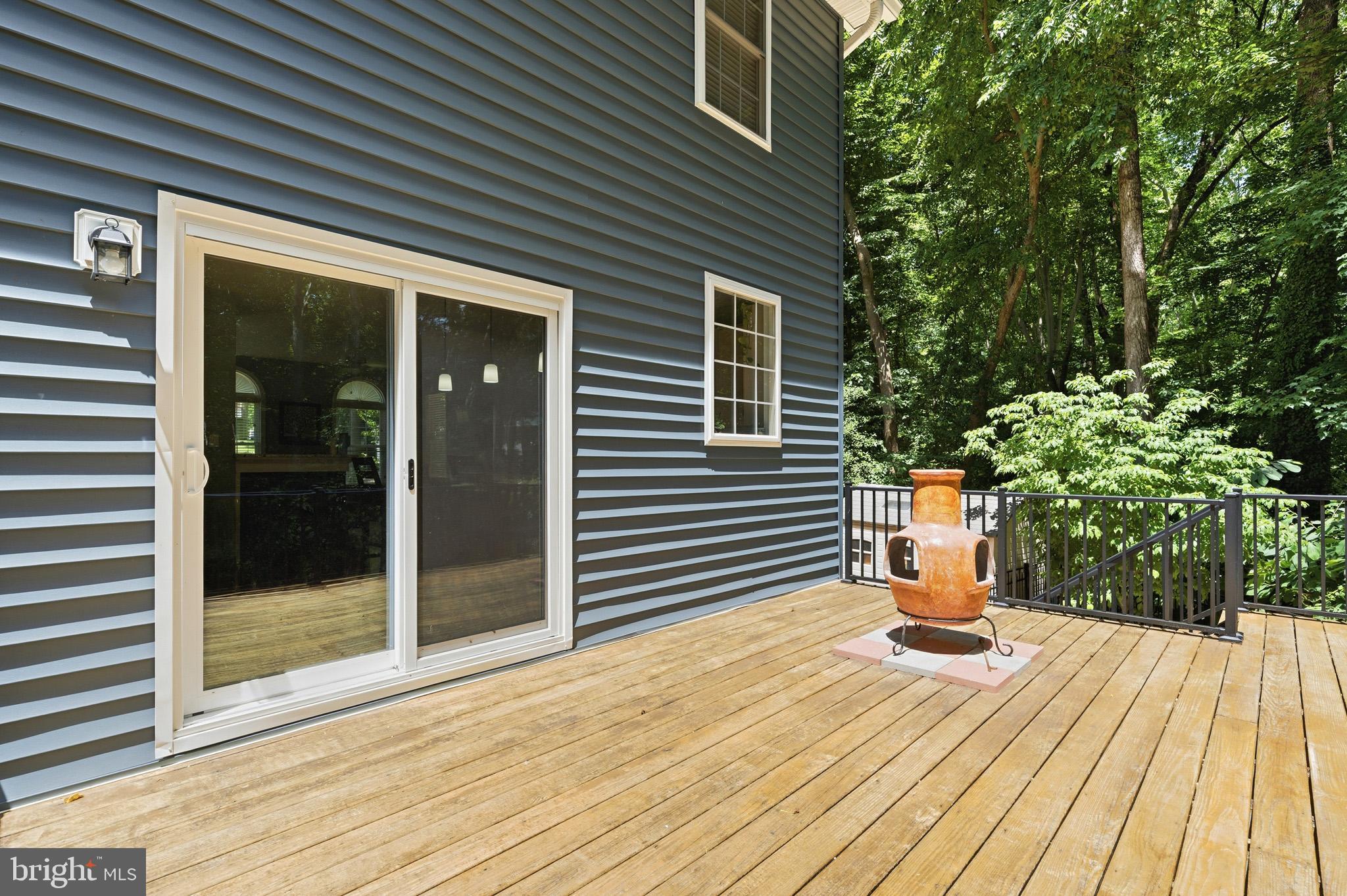 3148 Holland Cliffs Road Huntingtown, MD 20639 - Photo 37 of 61 Elevated Deck overlooking the backyard.