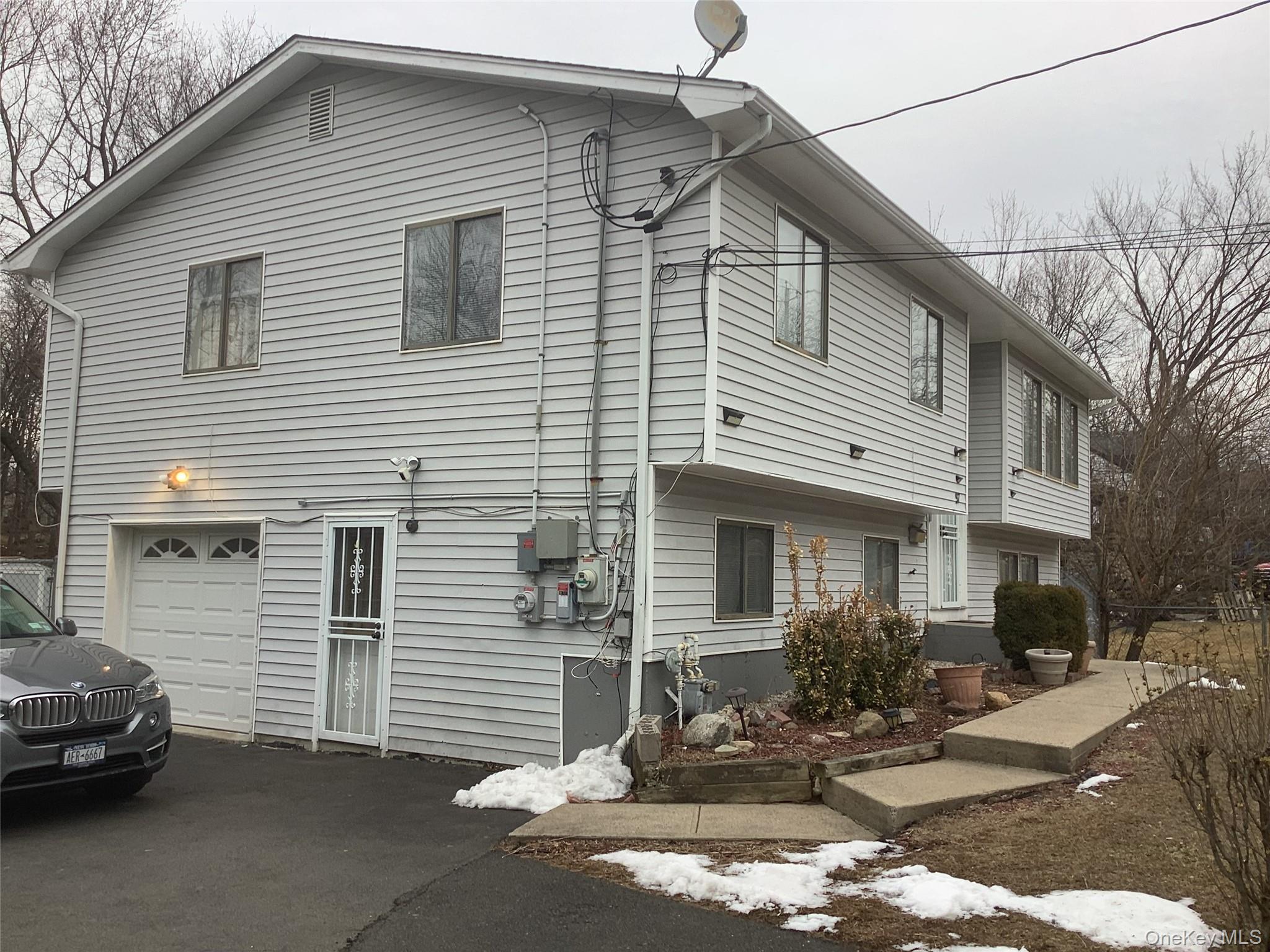 97 East Eckerson Road Spring Valley, NY 10977 - Photo 2 of 9 a view of a house with a patio