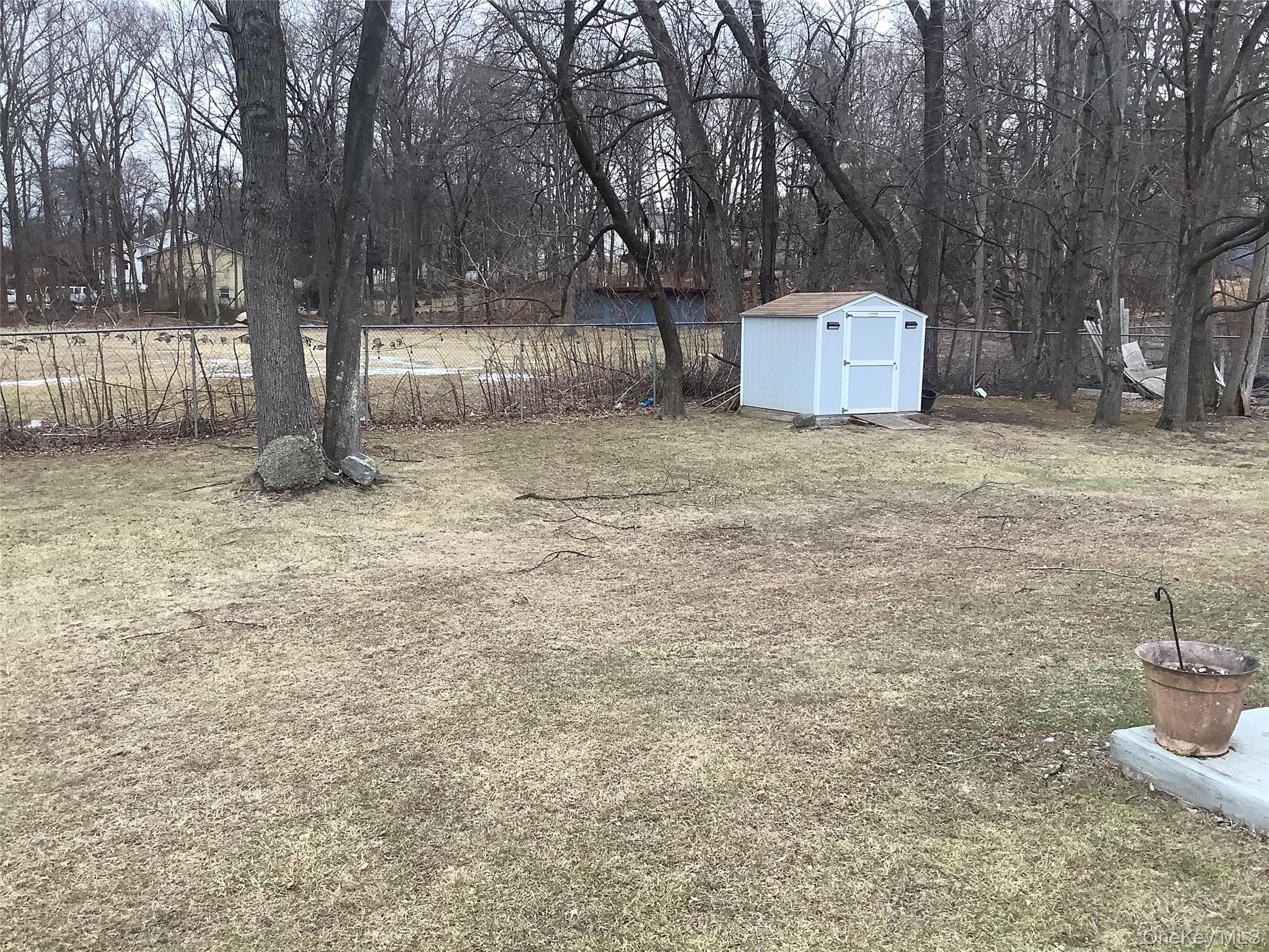 97 East Eckerson Road Spring Valley, NY 10977 - Photo 4 of 9 a backyard of a house with lots of green space