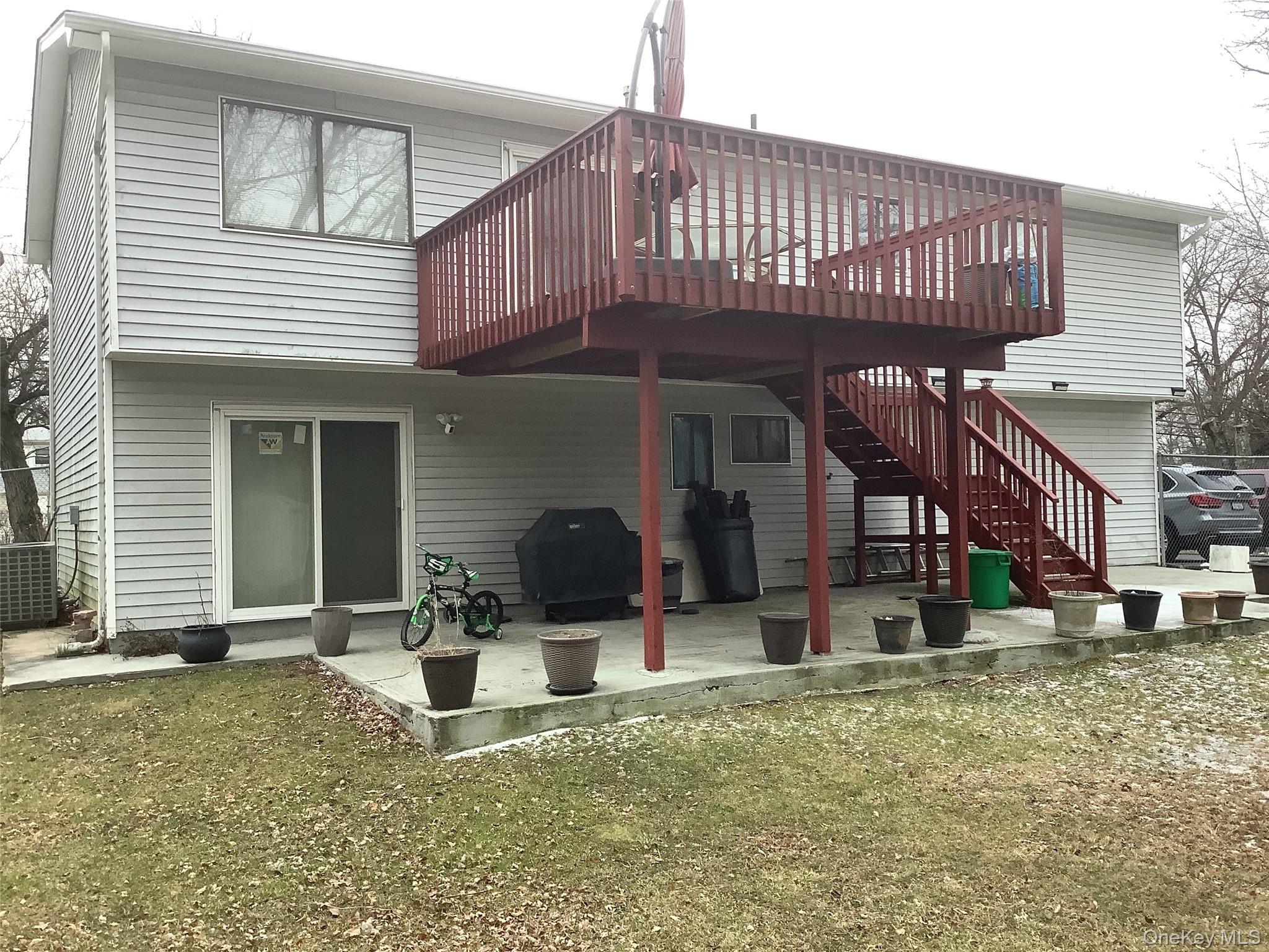 97 East Eckerson Road Spring Valley, NY 10977 - Photo 5 of 9 a view of a house with backyard porch and sitting area