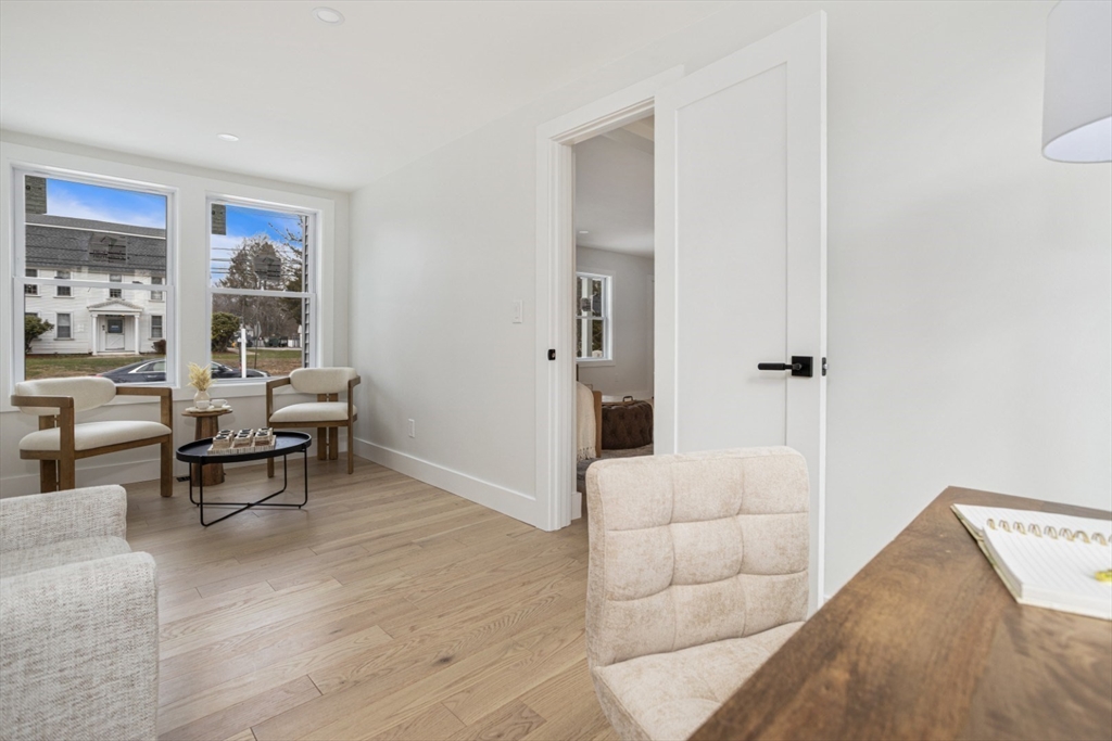 63 Kellogg Street Framingham, MA 01701 - Photo 18 of 38 a living room with furniture and a couch