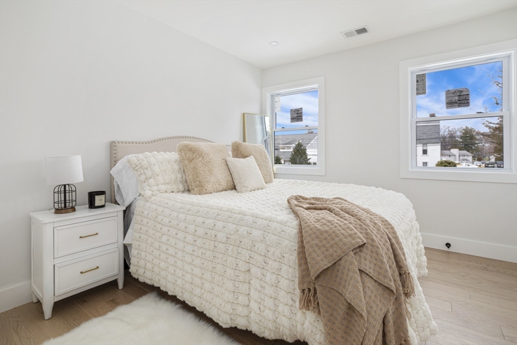 63 Kellogg Street Framingham, MA 01701 - Photo 24 of 38 a bedroom with a bed and a window