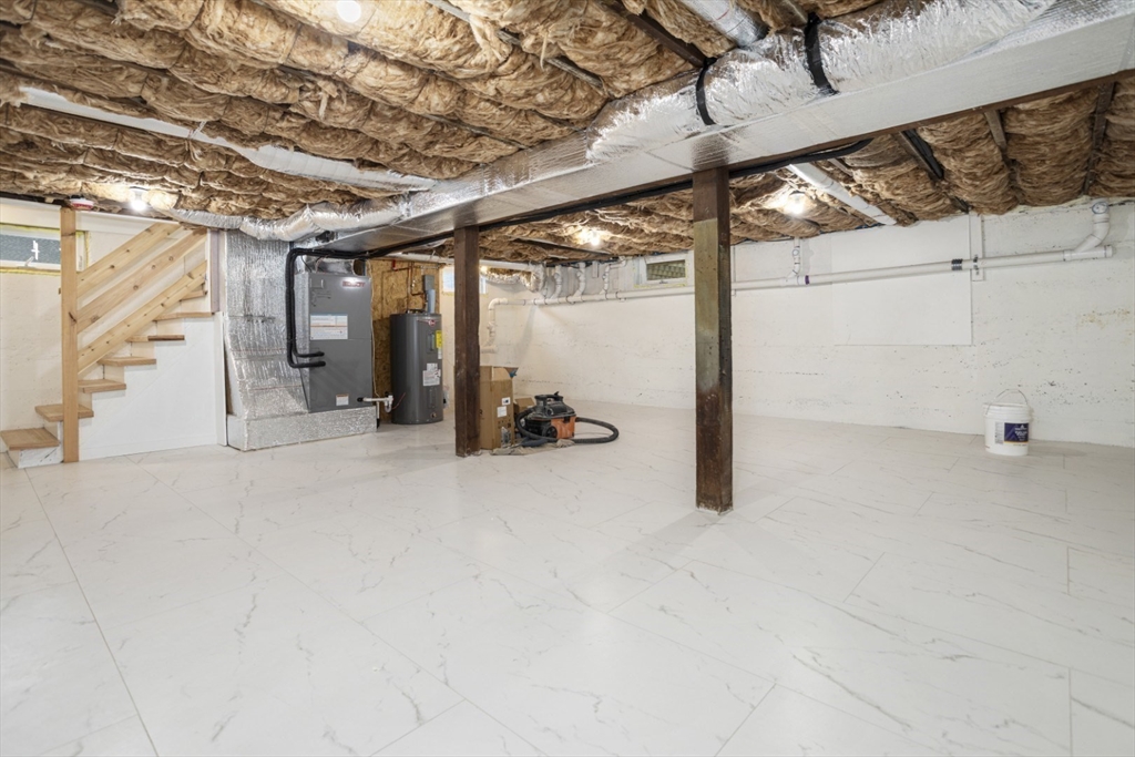 63 Kellogg Street Framingham, MA 01701 - Photo 29 of 38 a view of a room with gym equipment