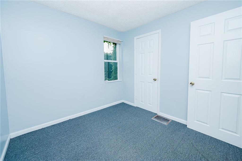1162 Water Street Indiana, PA 15701 - Photo 17 of 26 an empty room with windows