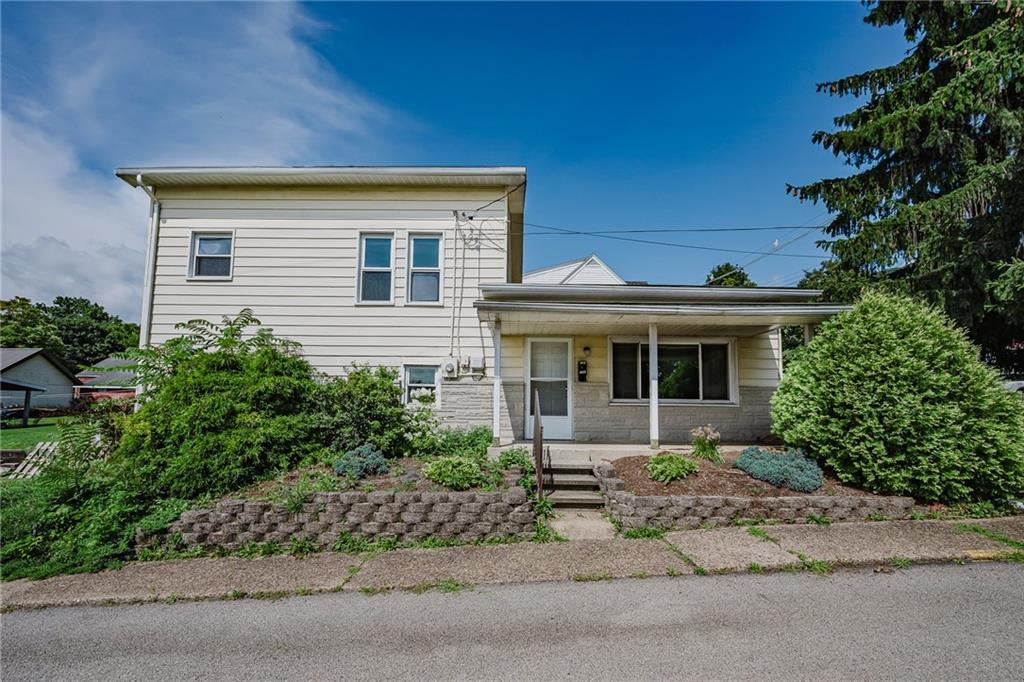 1162 Water Street Indiana, PA 15701 - Photo 2 of 26 front view of a house with a bench