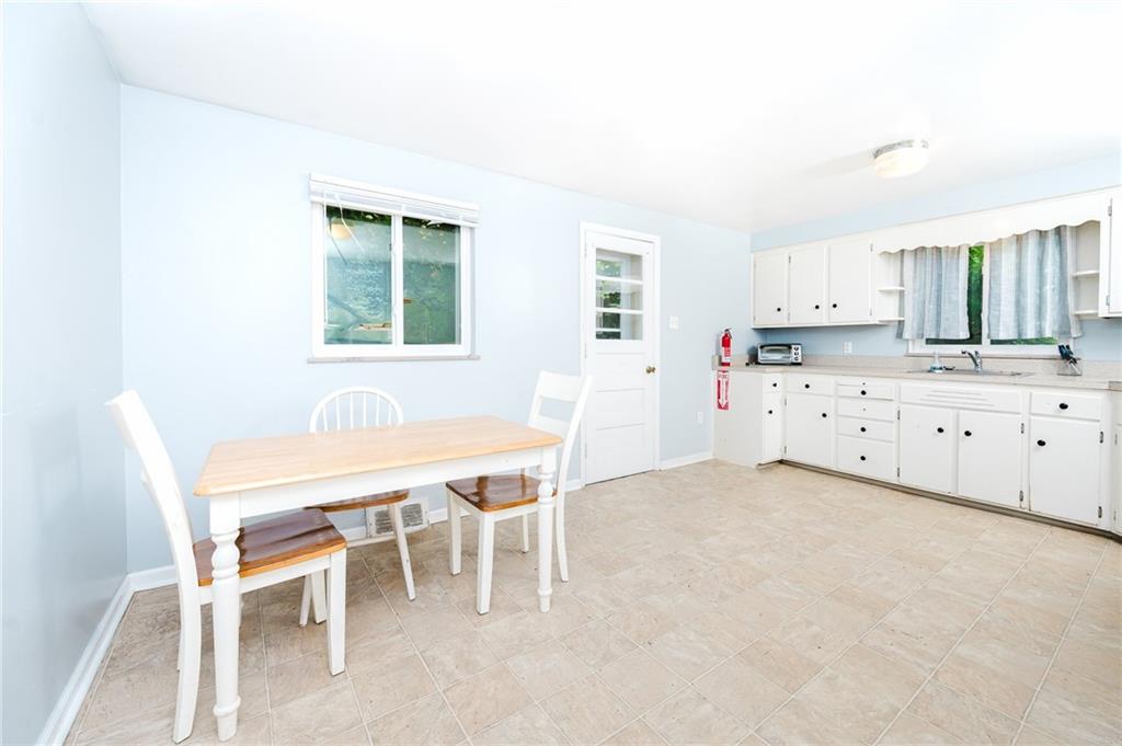 1162 Water Street Indiana, PA 15701 - Photo 6 of 26 a dining room with a table and chairs