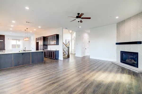 a view of room with wooden floor