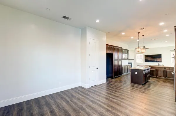 a view of an house with backyard porch and sitting area
