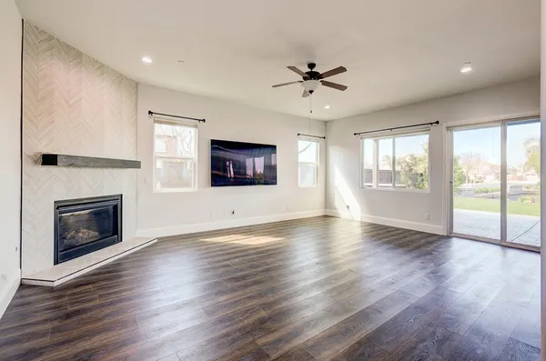 a kitchen with a stove and a window