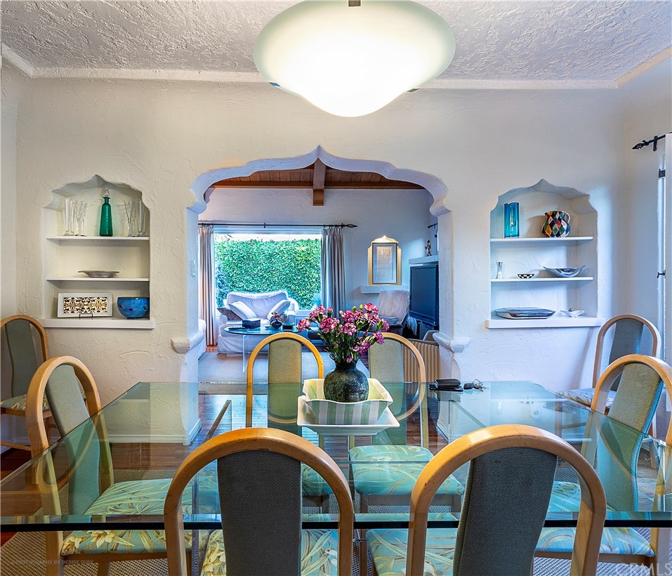 175 Granada Avenue Long Beach, CA 90803 - Photo 10 of 29 Looking from dining room through the scalloped arches to the living room.