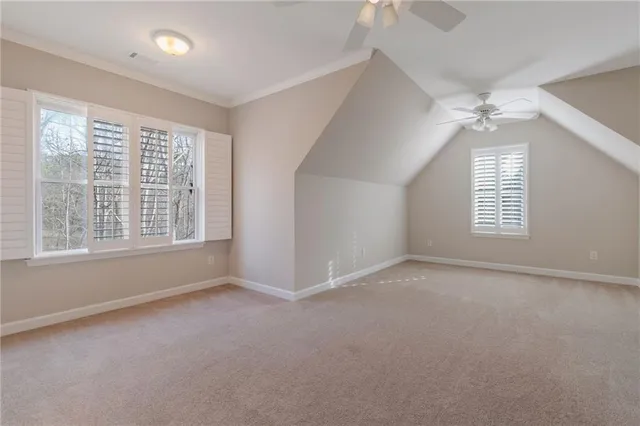 a view of an empty room with a balcony