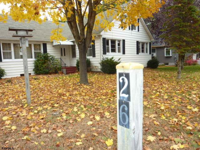26 Ridge Road Elmer, NJ 08318 - Photo 1 of 1 a front view of a house with garden