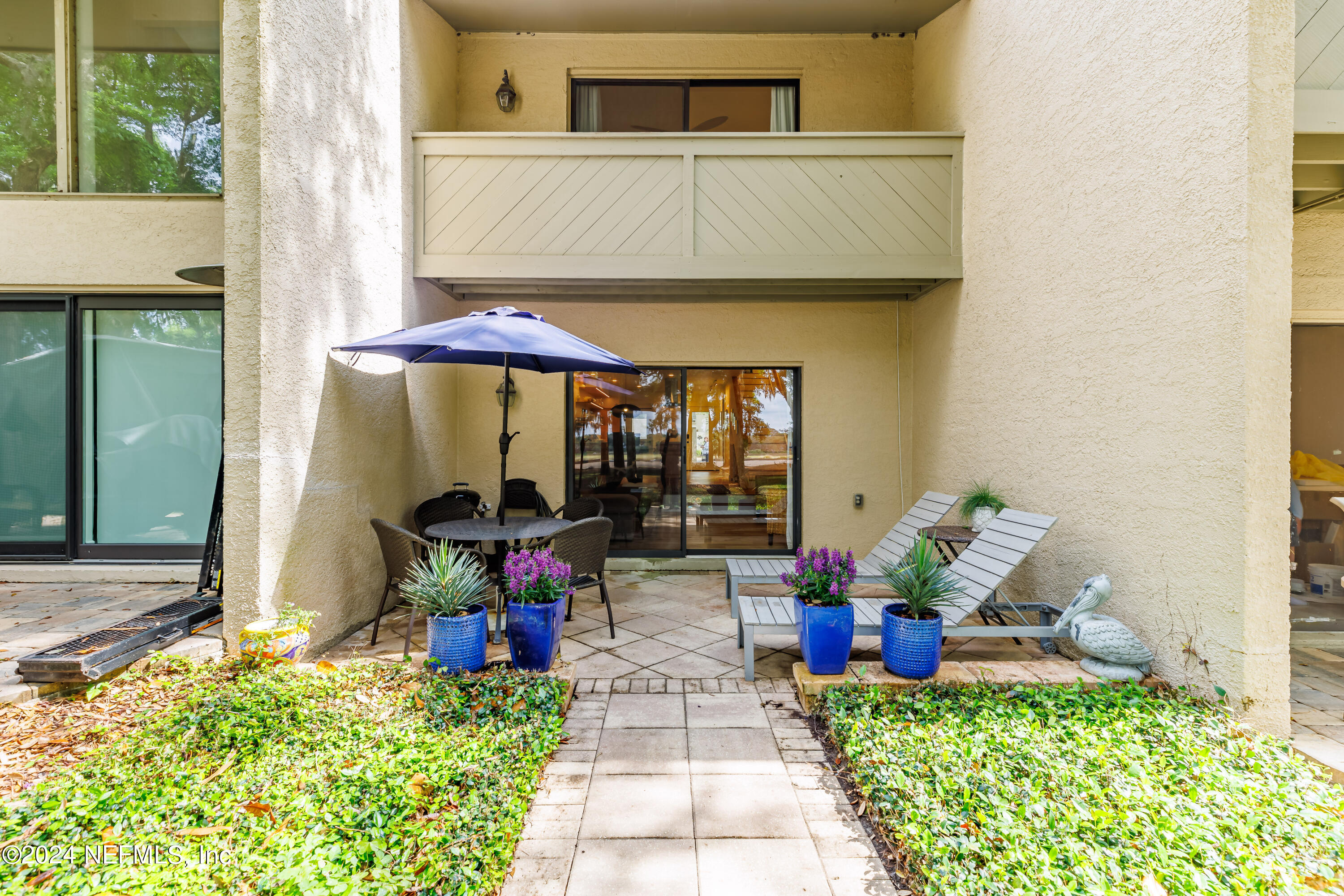 3025 Sea Marsh Road Fernandina Beach, FL 32034 - Photo 17 of 54 a front view of a house with chairs