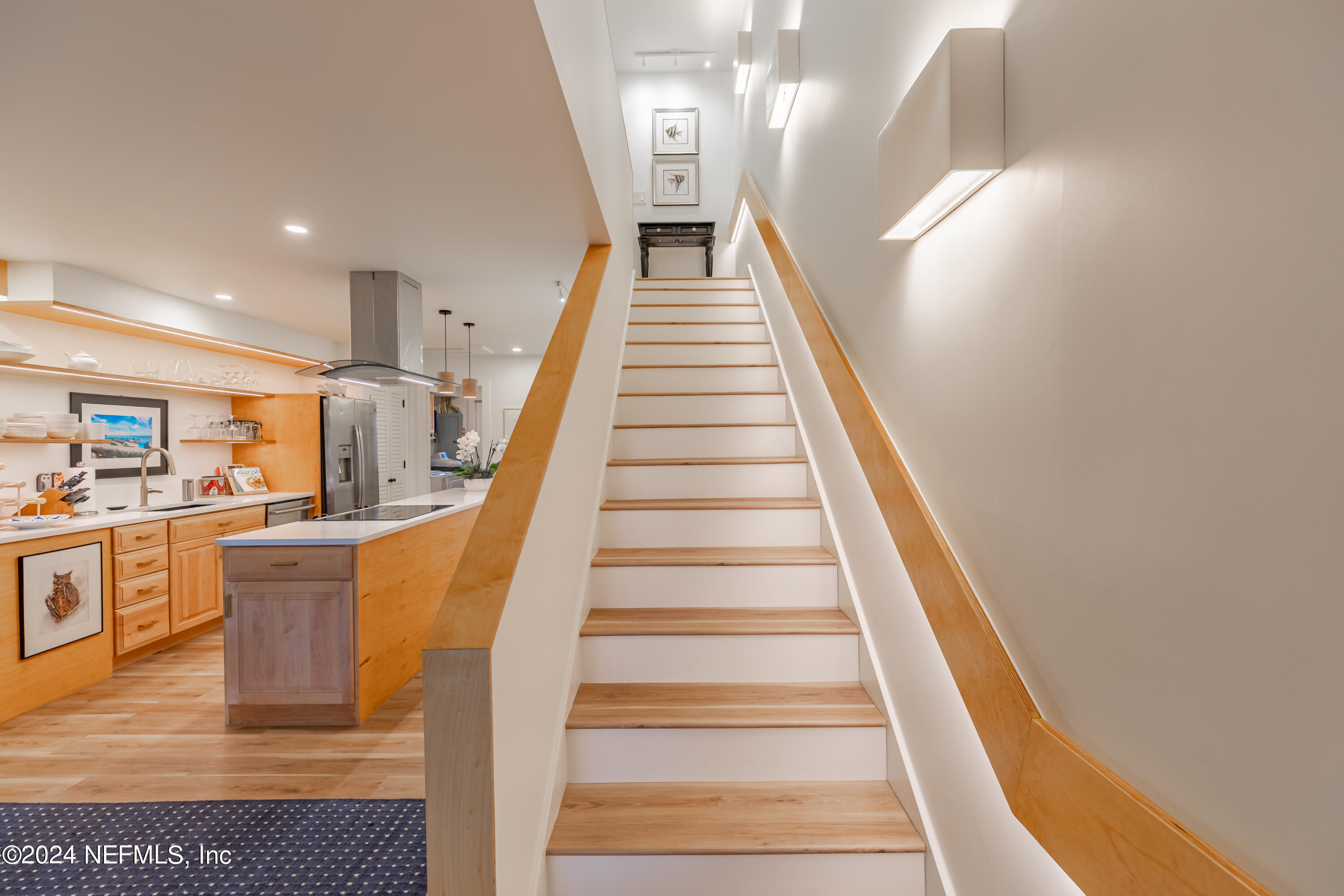 3025 Sea Marsh Road Fernandina Beach, FL 32034 - Photo 19 of 54 a view of entryway and hall with wooden floor