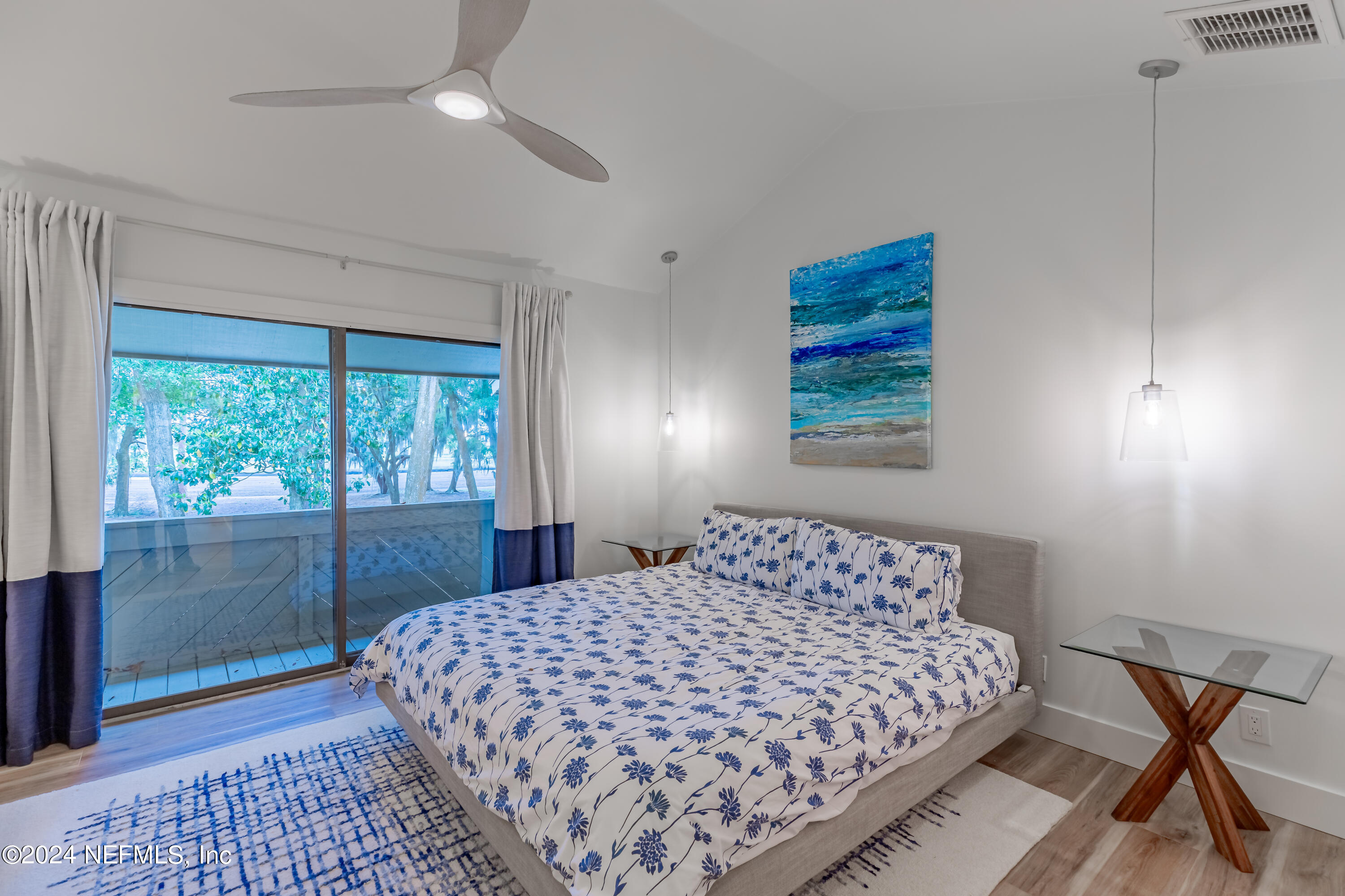 3025 Sea Marsh Road Fernandina Beach, FL 32034 - Photo 20 of 54 a bedroom with a bed and a window