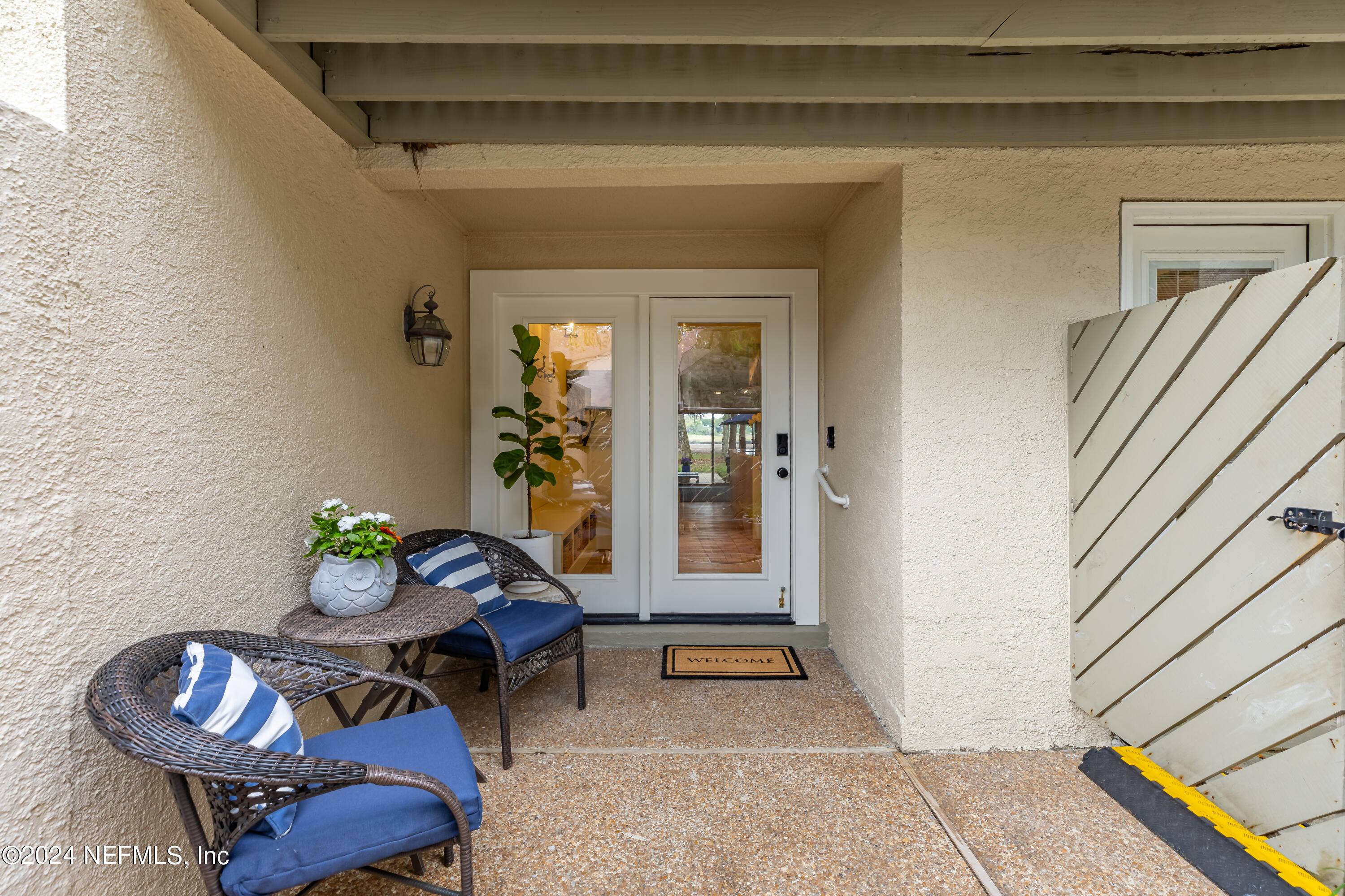 3025 Sea Marsh Road Fernandina Beach, FL 32034 - Photo 2 of 54 a living room with furniture and rug