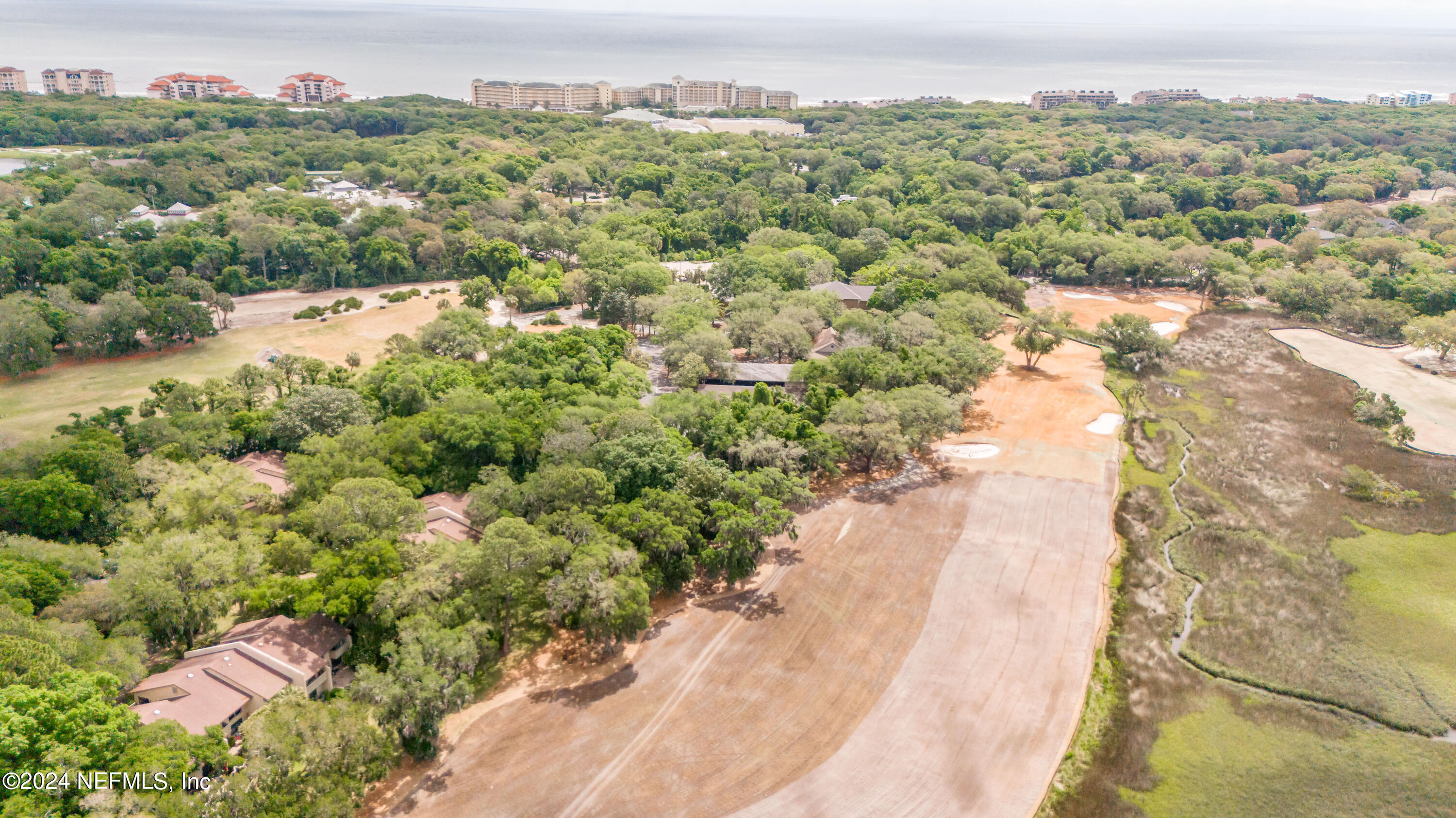 3025 Sea Marsh Road Fernandina Beach, FL 32034 - Photo 34 of 54 an aerial view of a houses with a yard