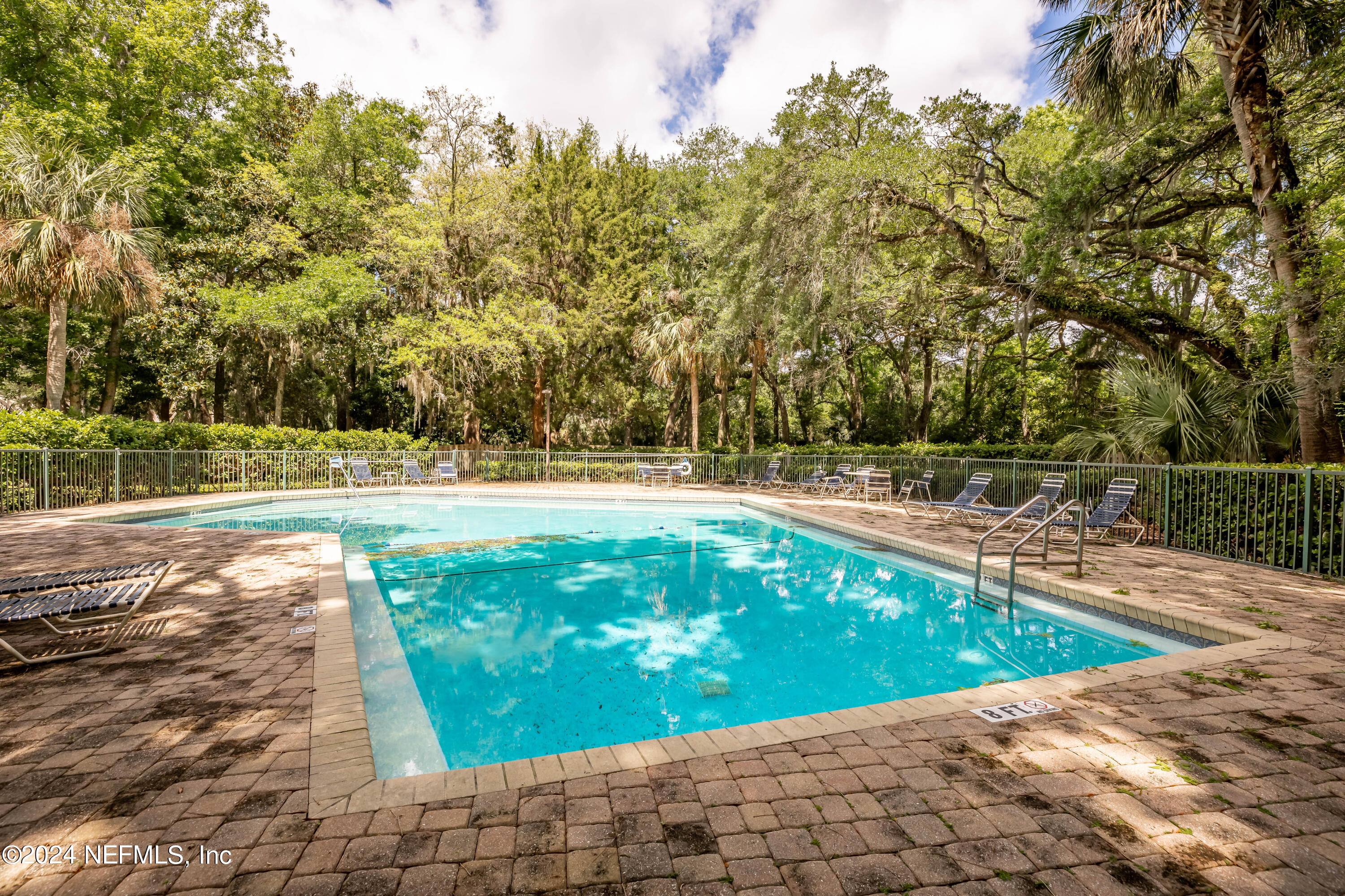 3025 Sea Marsh Road Fernandina Beach, FL 32034 - Photo 40 of 54 a view of a swimming pool with a yard