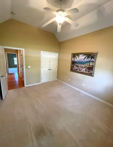 a view of a water heater room with a garage