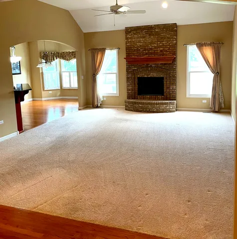 a view of a livingroom with a fireplace